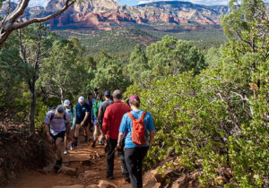 groups of hikers encountering one another along a trail