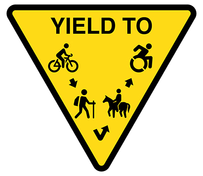 respect other users four user yield sign: cyclists yield to hikers, hikers yield to equestrians, and equestrians yield to assisted device users